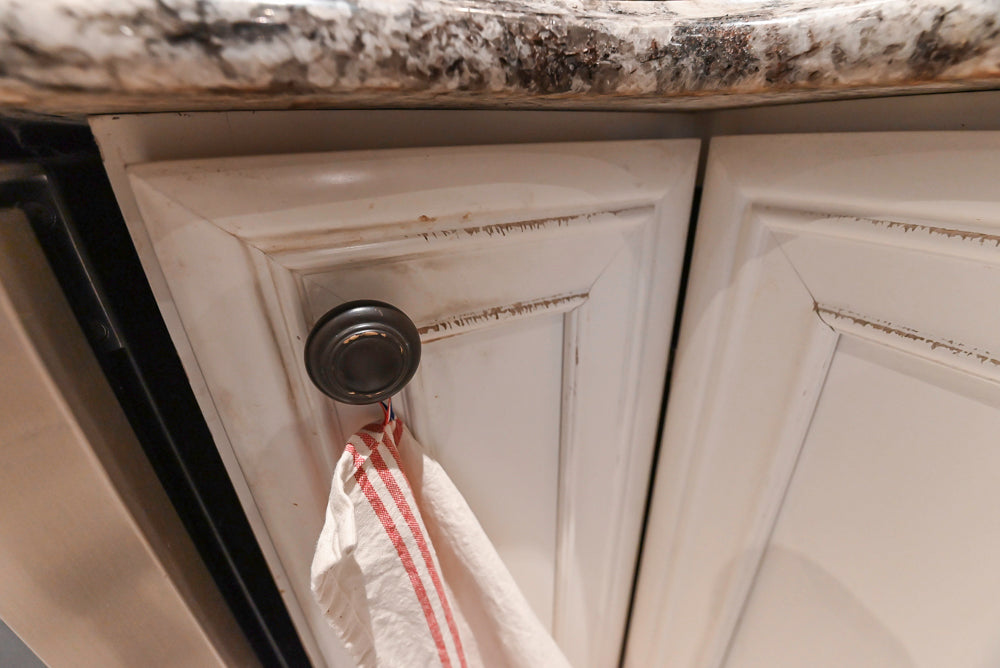 Candelight Traditional Off White Kitchen with Island and Monogram Appliances