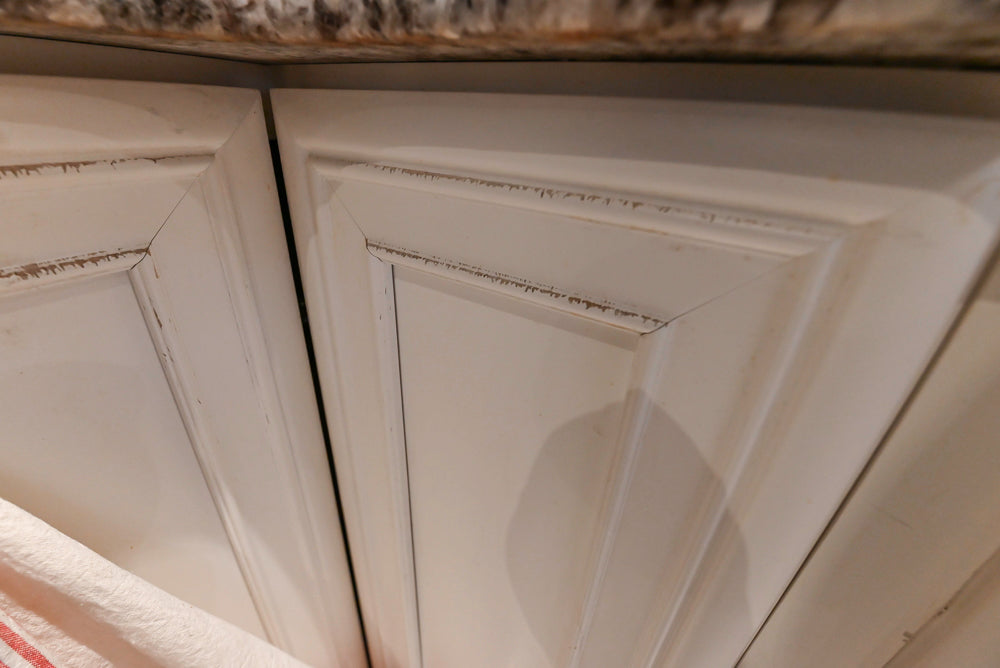 Candelight Traditional Off White Kitchen with Island and Monogram Appliances