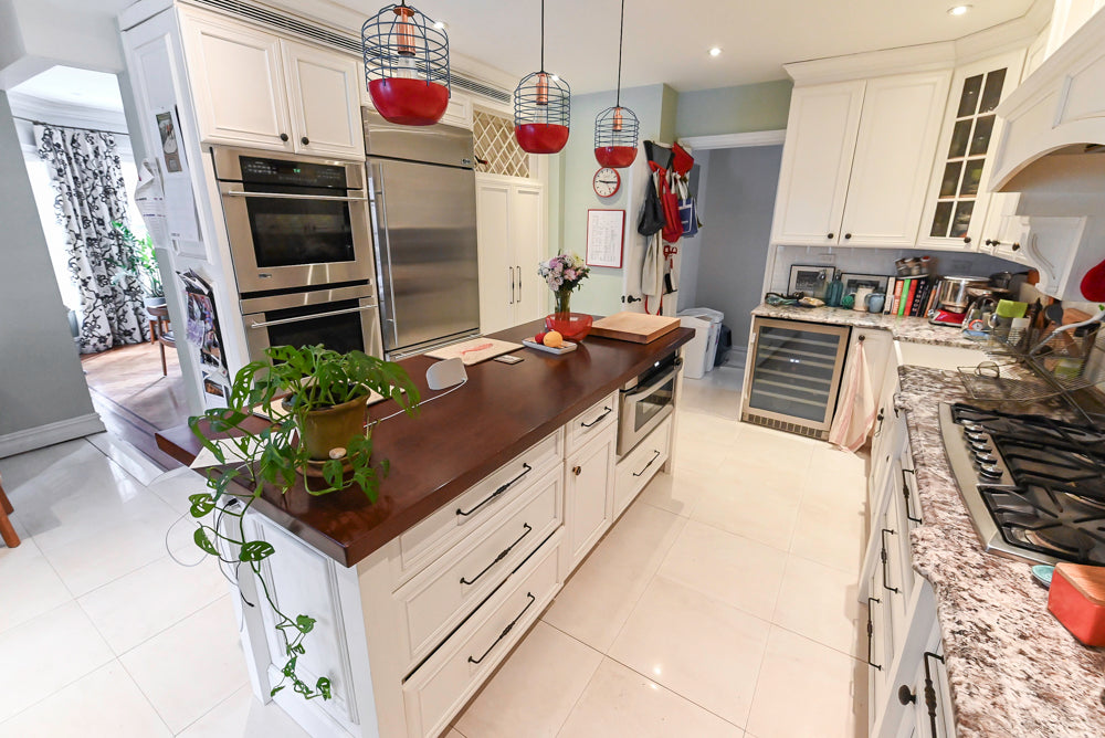 Candelight Traditional Off White Kitchen with Island and Monogram Appliances