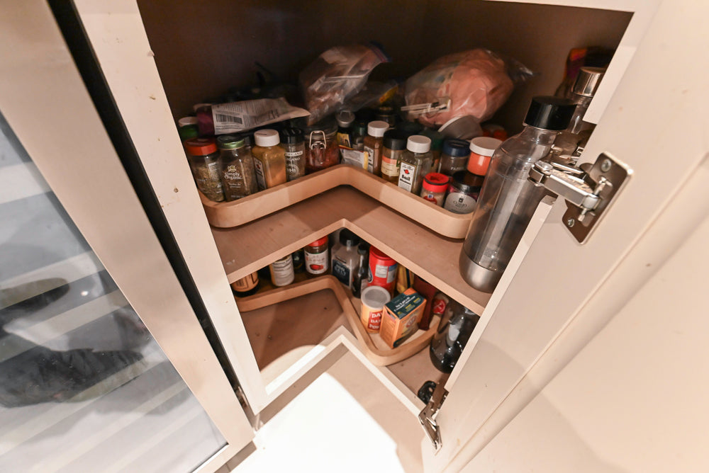 Candelight Traditional Off White Kitchen with Island and Monogram Appliances