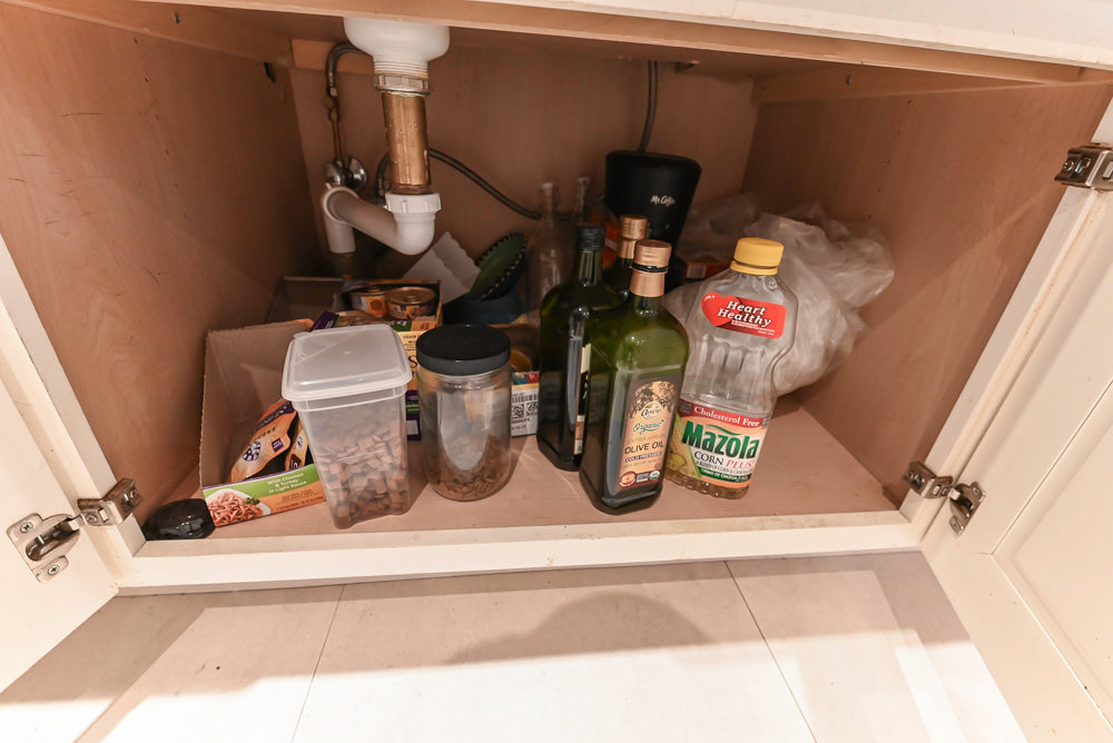 Candelight Traditional Off White Kitchen with Island and Monogram Appliances