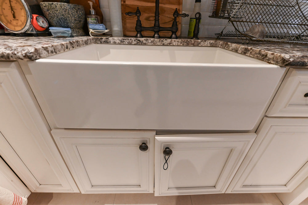 Candelight Traditional Off White Kitchen with Island and Monogram Appliances