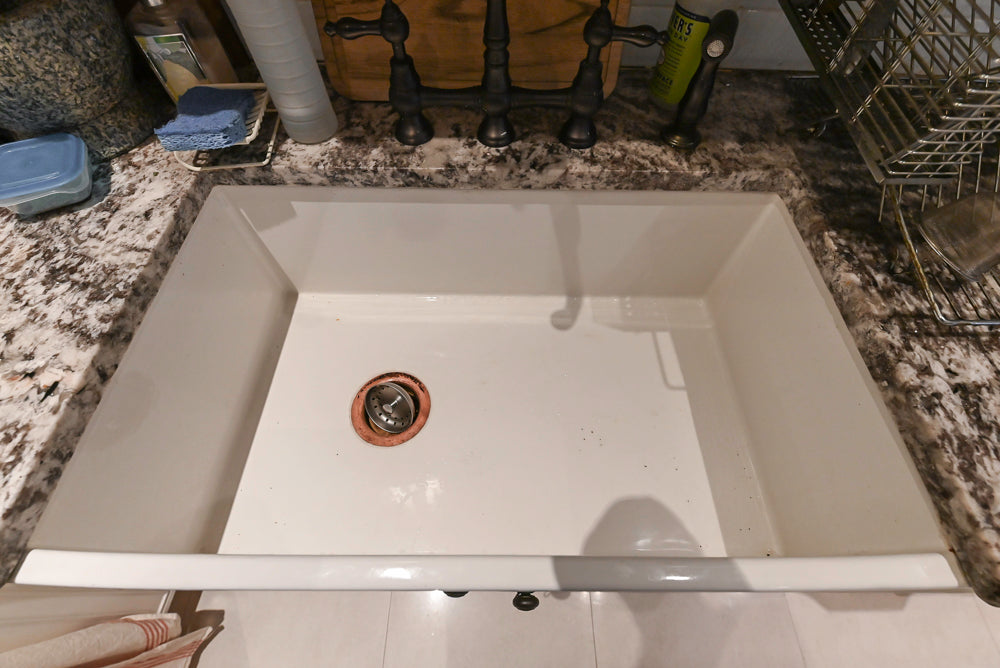 Candelight Traditional Off White Kitchen with Island and Monogram Appliances