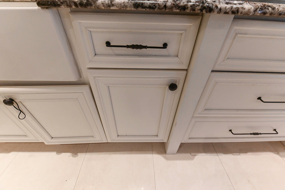 Candelight Traditional Off White Kitchen with Island and Monogram Appliances