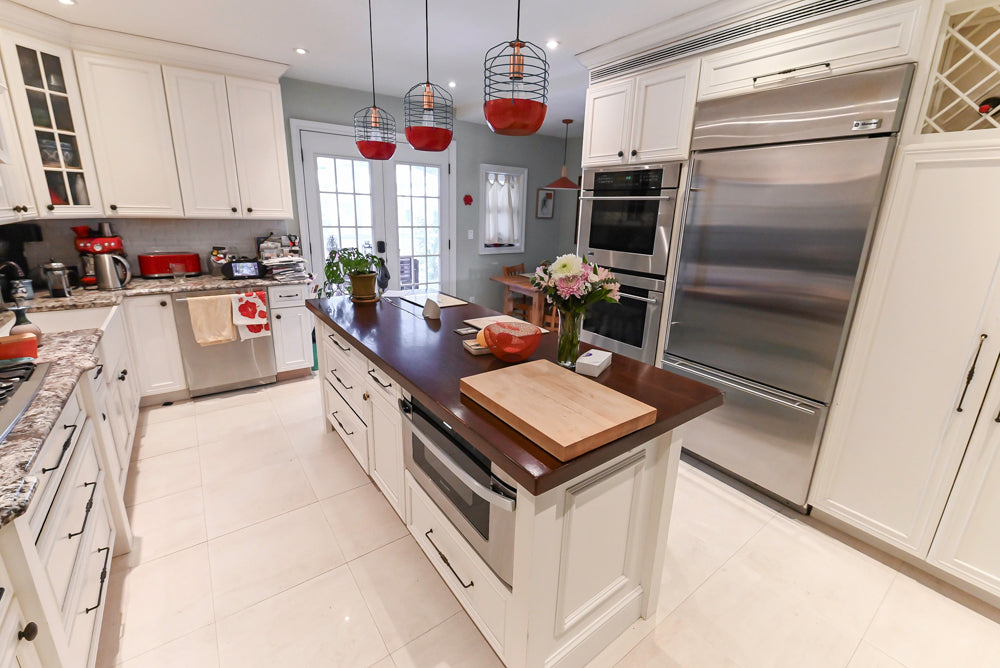 Candelight Traditional Off White Kitchen with Island and Monogram Appliances