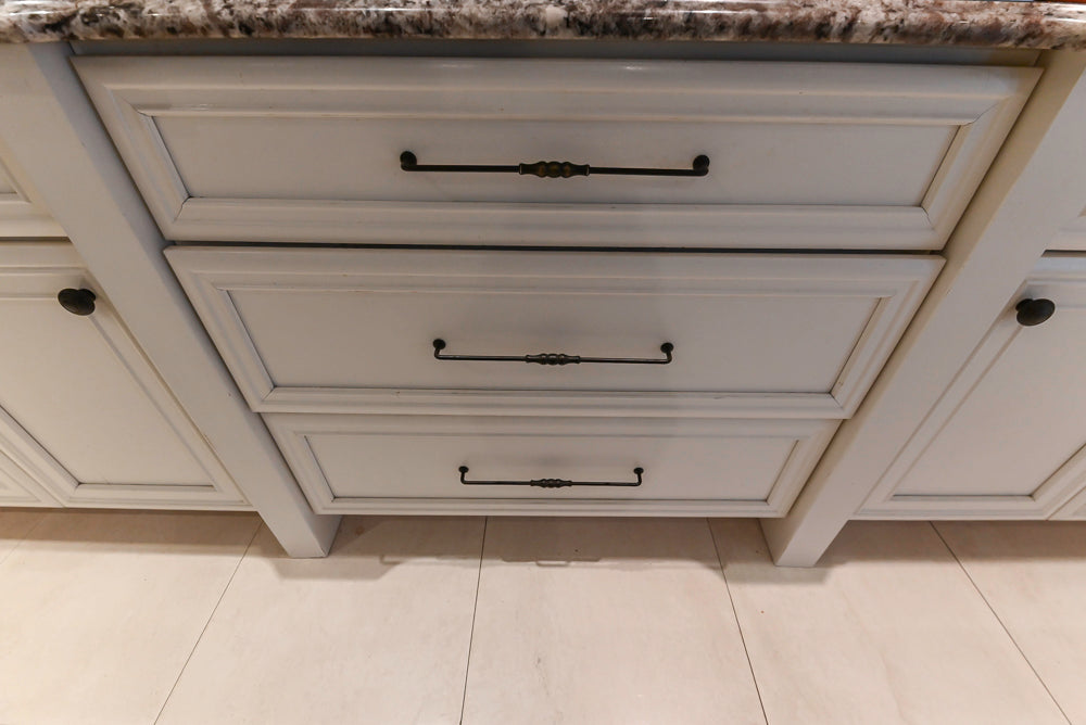 Candelight Traditional Off White Kitchen with Island and Monogram Appliances