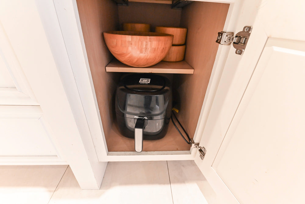 Candelight Traditional Off White Kitchen with Island and Monogram Appliances