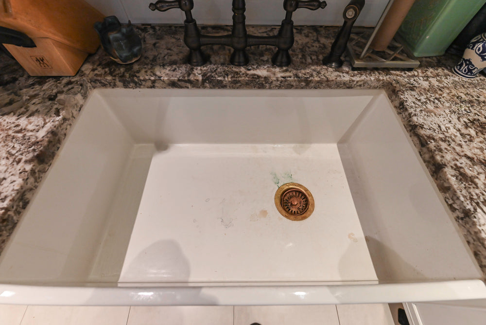 Candelight Traditional Off White Kitchen with Island and Monogram Appliances