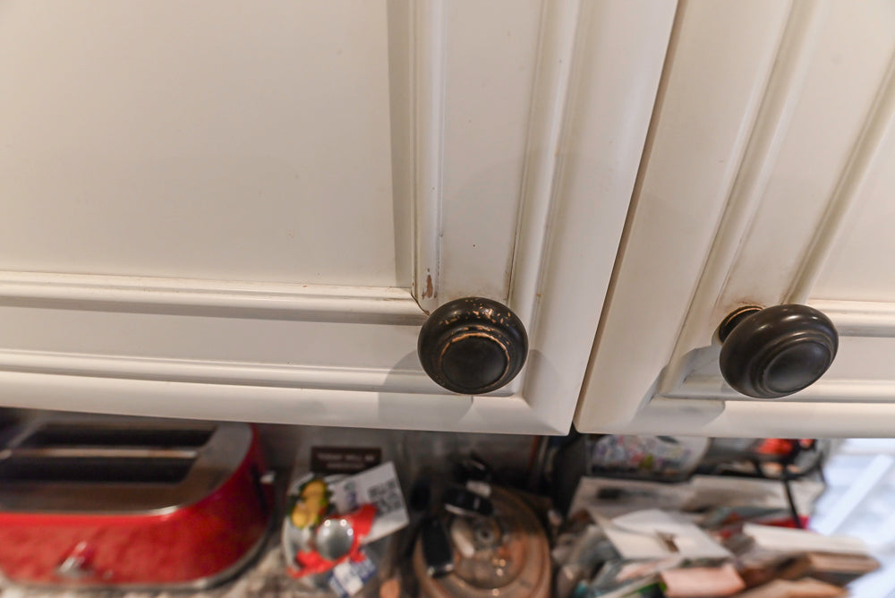 Candelight Traditional Off White Kitchen with Island and Monogram Appliances