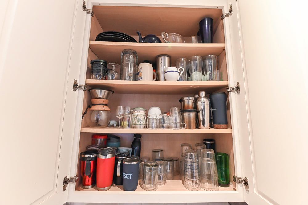 Candelight Traditional Off White Kitchen with Island and Monogram Appliances