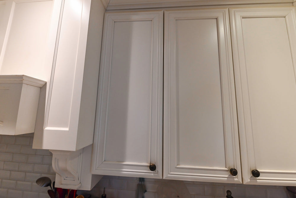 Candelight Traditional Off White Kitchen with Island and Monogram Appliances