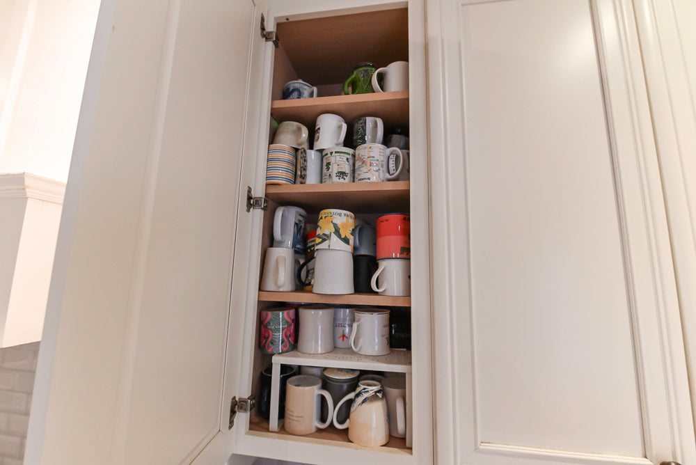 Candelight Traditional Off White Kitchen with Island and Monogram Appliances