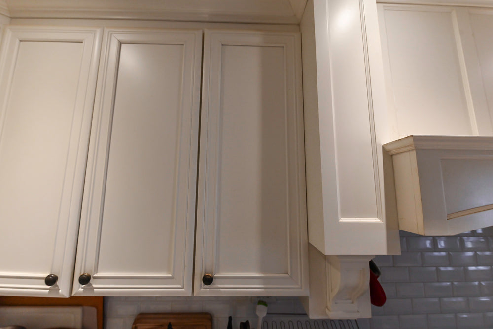 Candelight Traditional Off White Kitchen with Island and Monogram Appliances