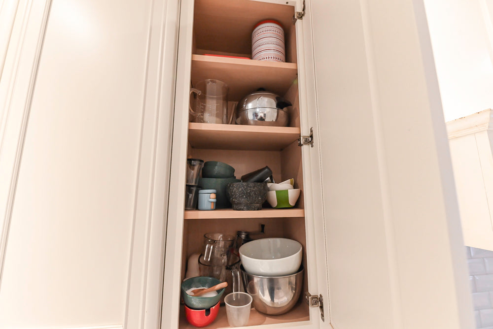 Candelight Traditional Off White Kitchen with Island and Monogram Appliances