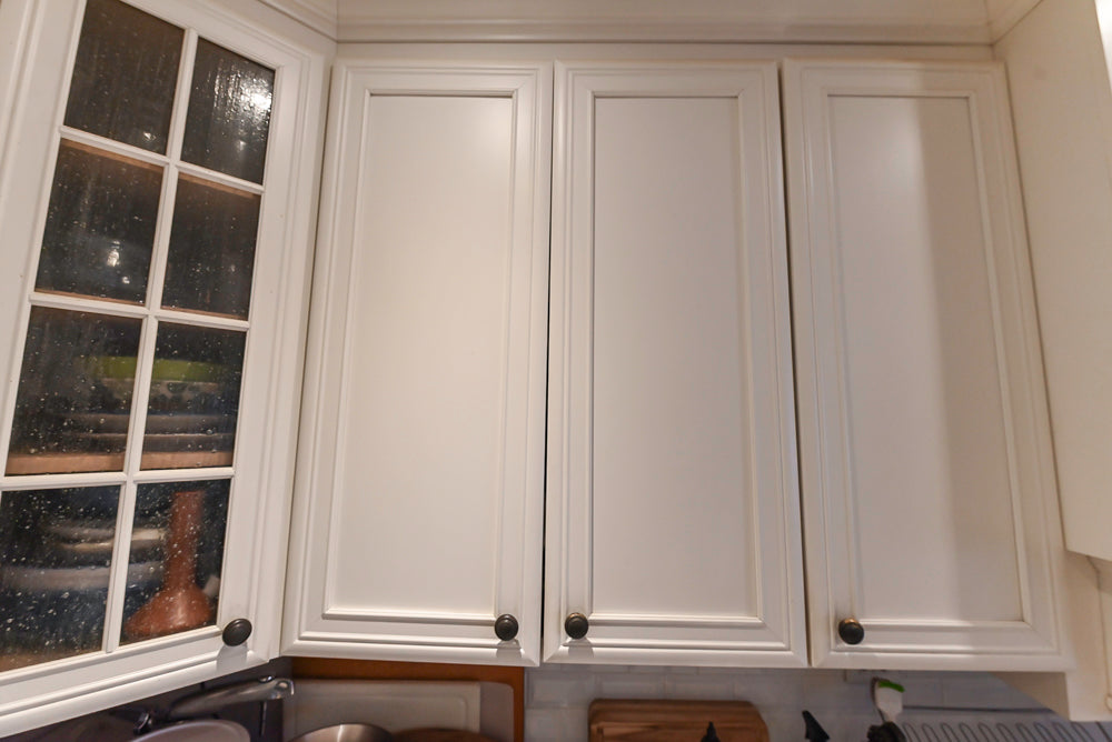 Candelight Traditional Off White Kitchen with Island and Monogram Appliances