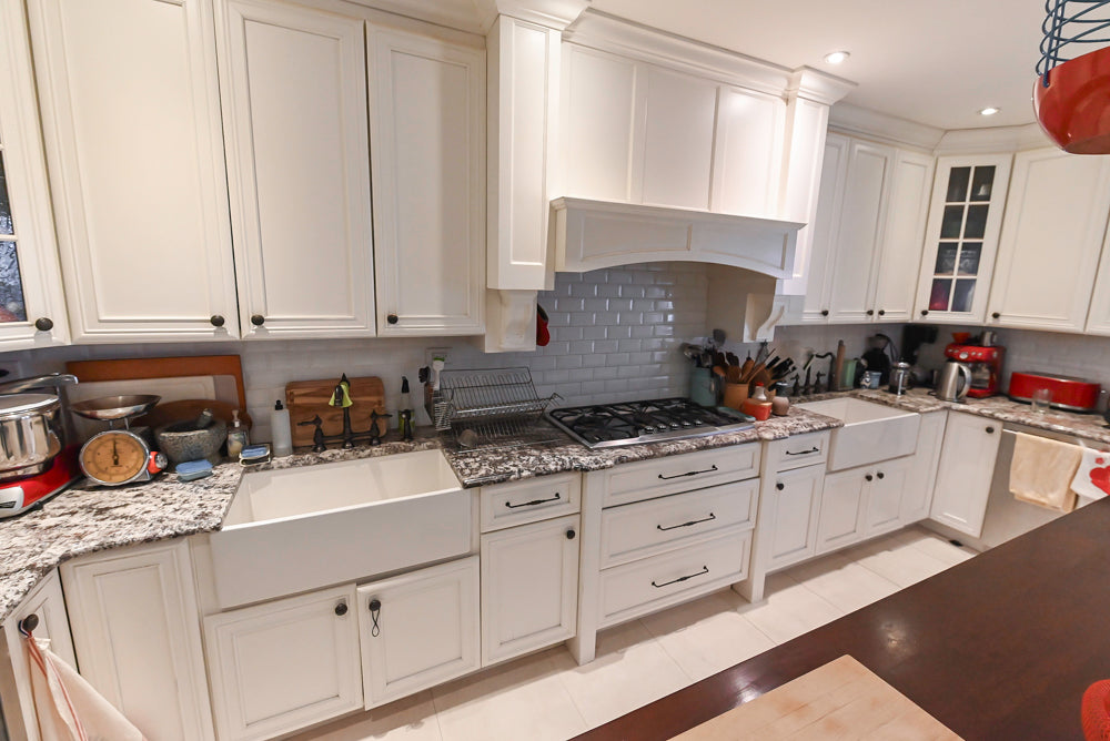 Candelight Traditional Off White Kitchen with Island and Monogram Appliances