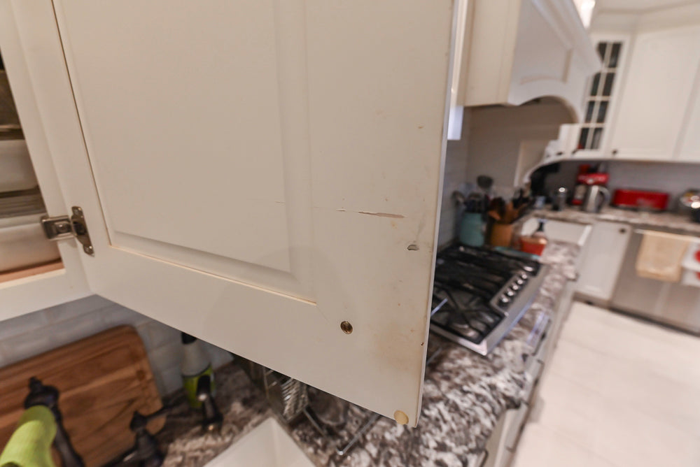 Candelight Traditional Off White Kitchen with Island and Monogram Appliances