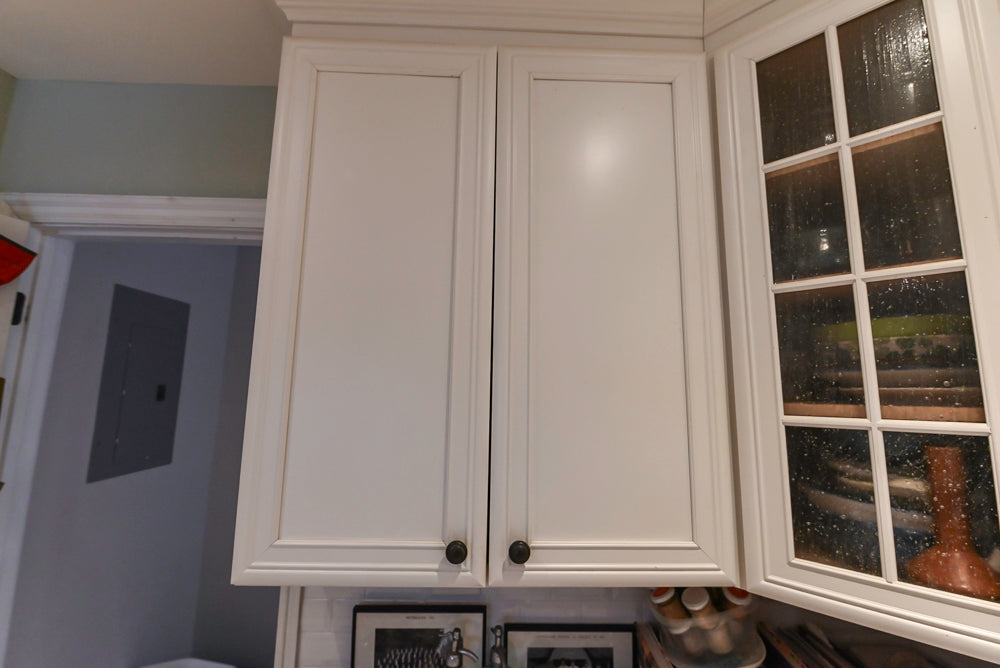 Candelight Traditional Off White Kitchen with Island and Monogram Appliances