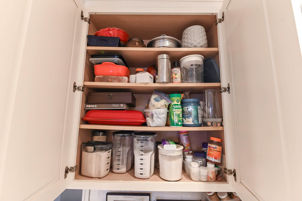 Candelight Traditional Off White Kitchen with Island and Monogram Appliances