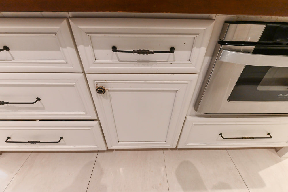 Candelight Traditional Off White Kitchen with Island and Monogram Appliances