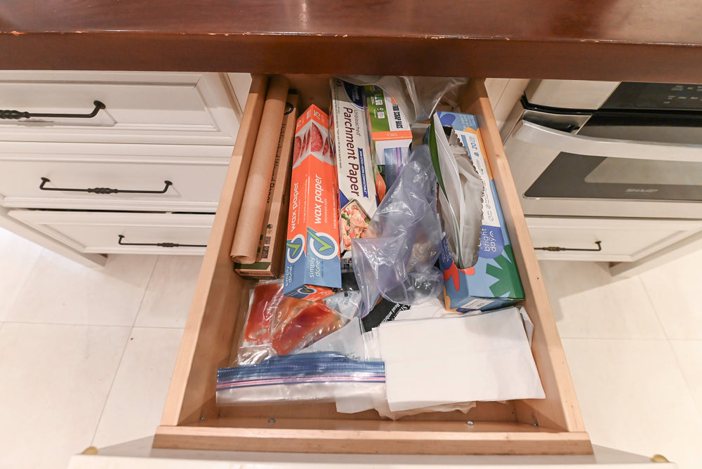 Candelight Traditional Off White Kitchen with Island and Monogram Appliances