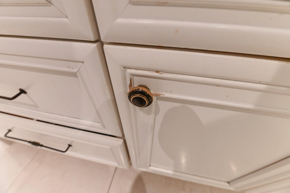 Candelight Traditional Off White Kitchen with Island and Monogram Appliances