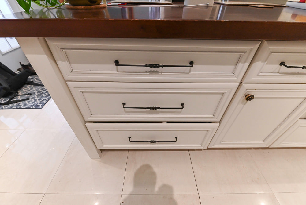 Candelight Traditional Off White Kitchen with Island and Monogram Appliances
