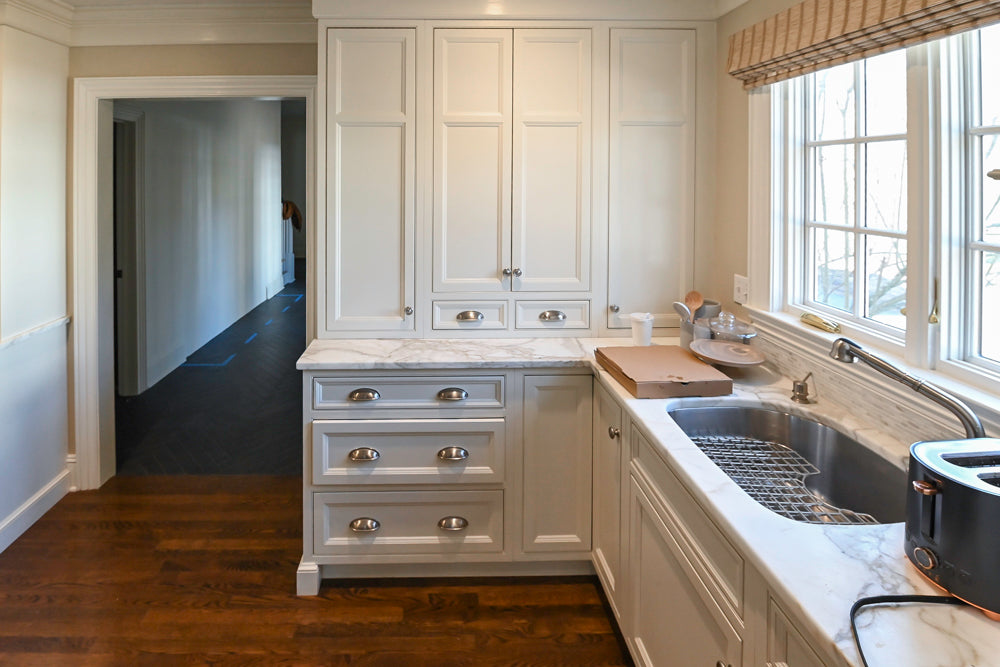 Plain & Fancy Traditional White Kitchen with Island, Marble Countertops & Appliances