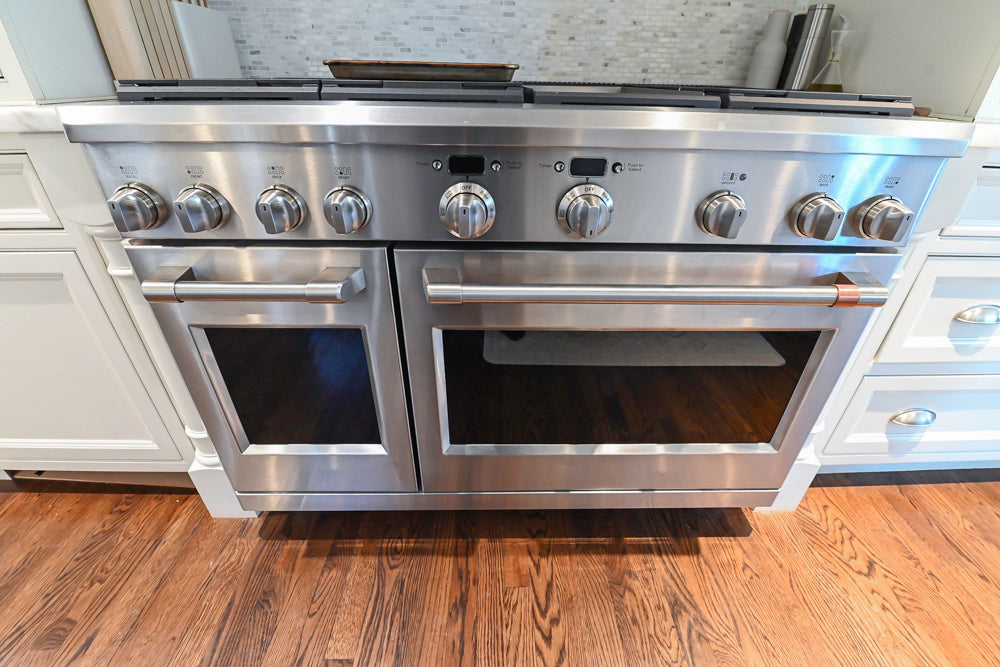 Plain & Fancy Traditional White Kitchen with Island, Marble Countertops & Appliances