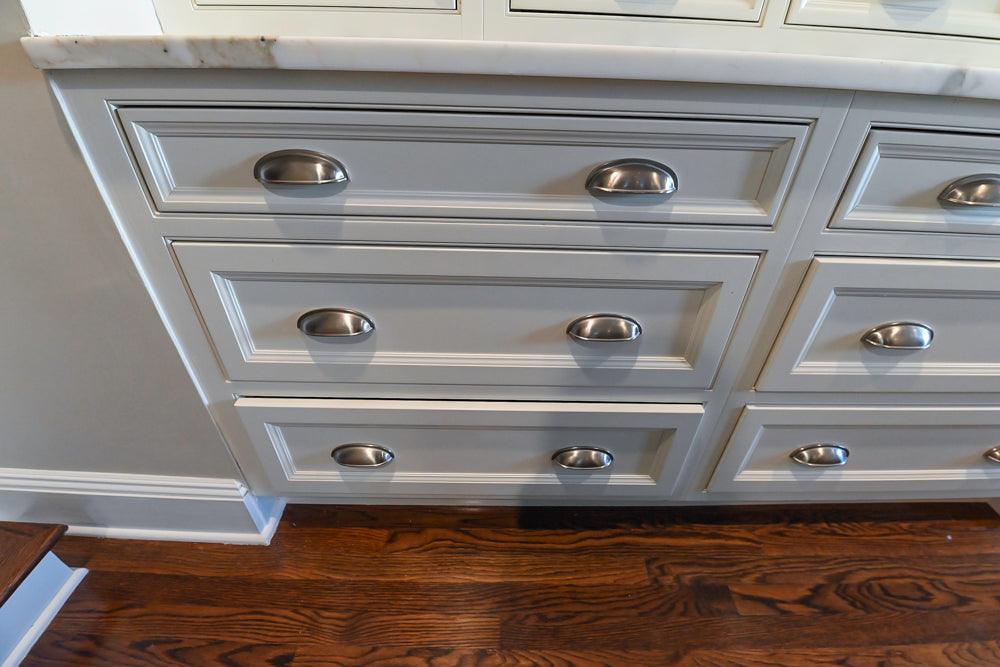 Plain & Fancy Traditional White Kitchen with Island, Marble Countertops & Appliances