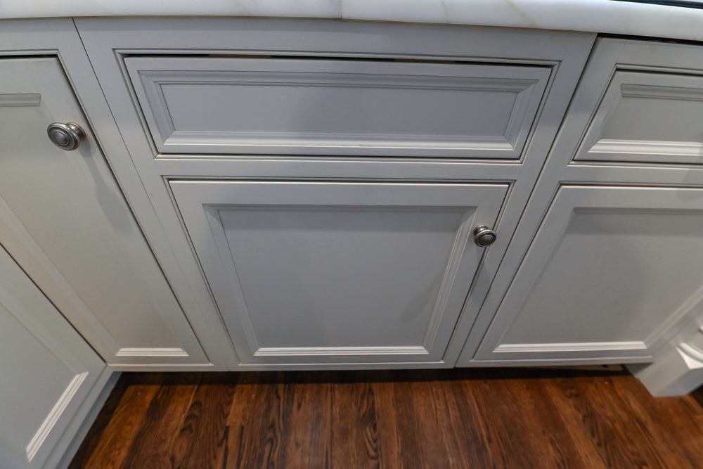 Plain & Fancy Traditional White Kitchen with Island, Marble Countertops & Appliances