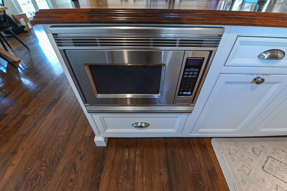 Plain & Fancy Traditional White Kitchen with Island, Marble Countertops & Appliances
