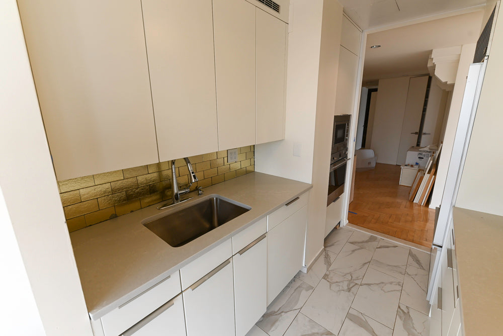 Leicht Modern Off White Kitchenette with Quartz Countertops & Smeg Appliances