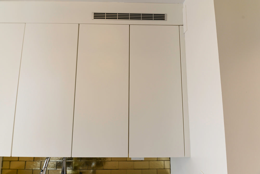 Leicht Modern Off White Kitchenette with Quartz Countertops & Smeg Appliances
