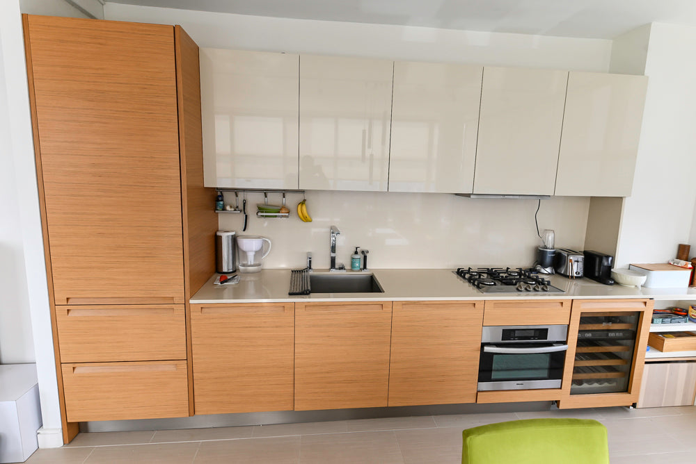 Contemporary Poliform kitchen with matching sideboard and premium stone counters