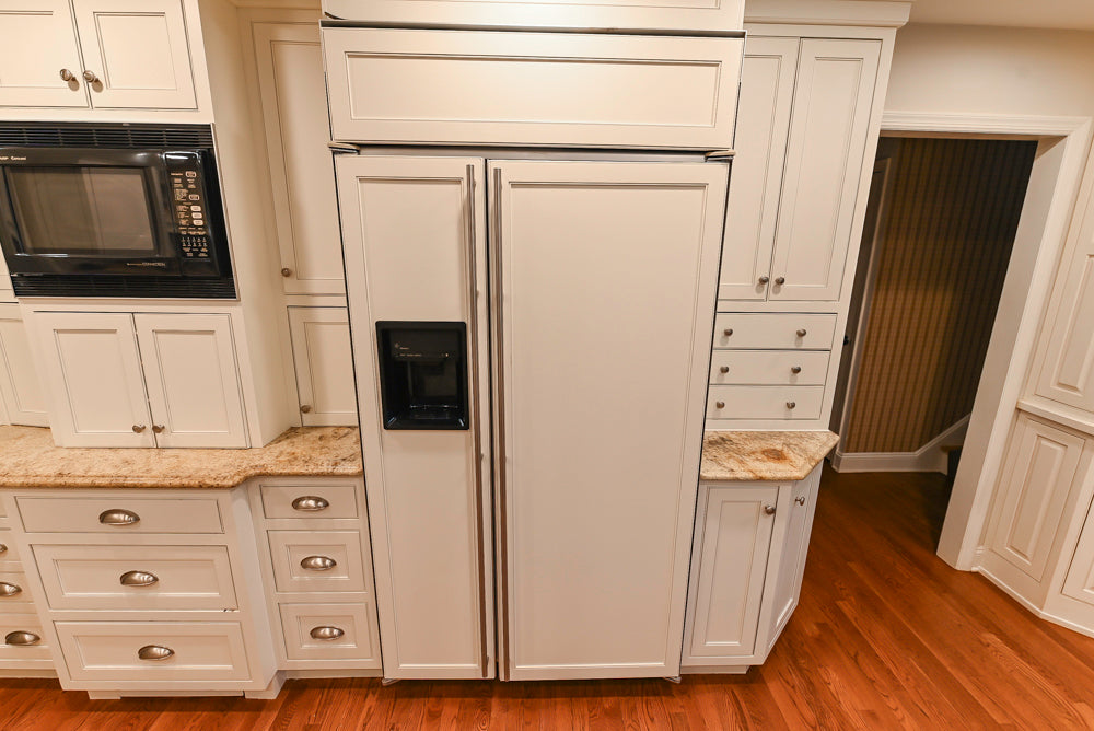 Plain & Fancy White Kitchen with Side Pantry & Appliances