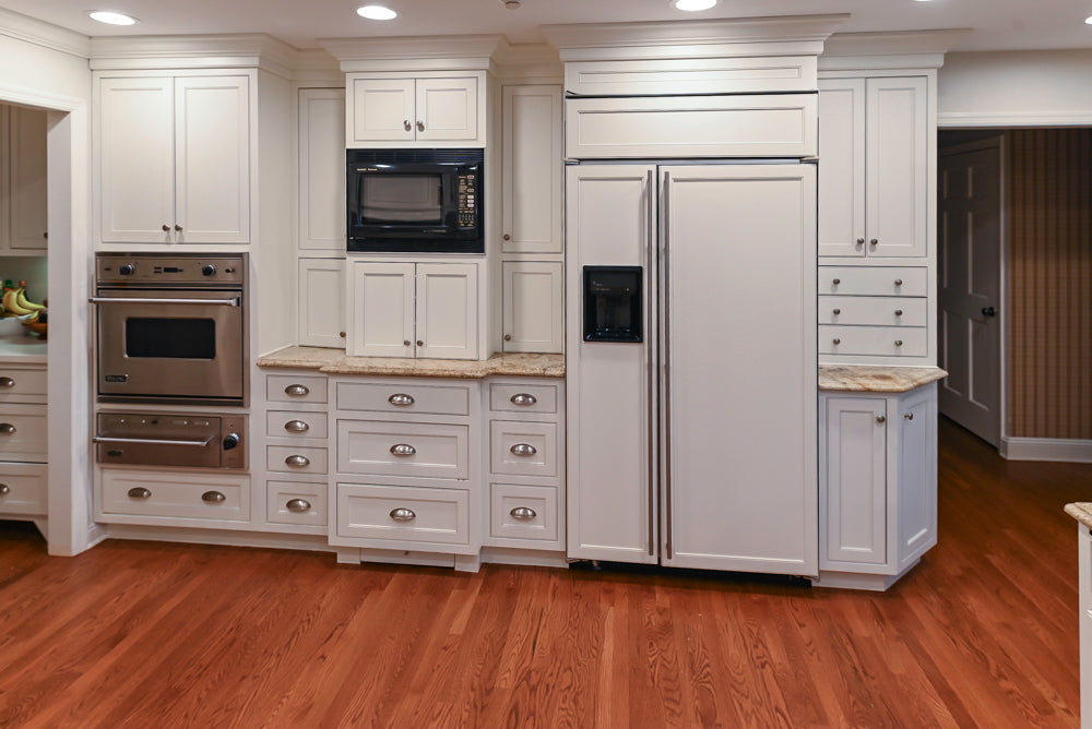 Plain & Fancy White Kitchen with Side Pantry & Appliances