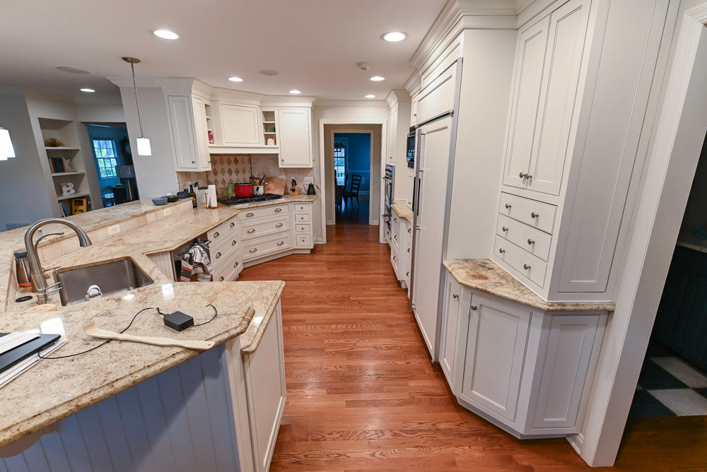 Plain & Fancy White Kitchen with Side Pantry & Appliances
