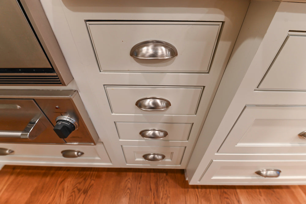 Plain & Fancy White Kitchen with Side Pantry & Appliances