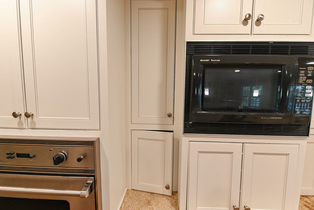 Plain & Fancy White Kitchen with Side Pantry & Appliances