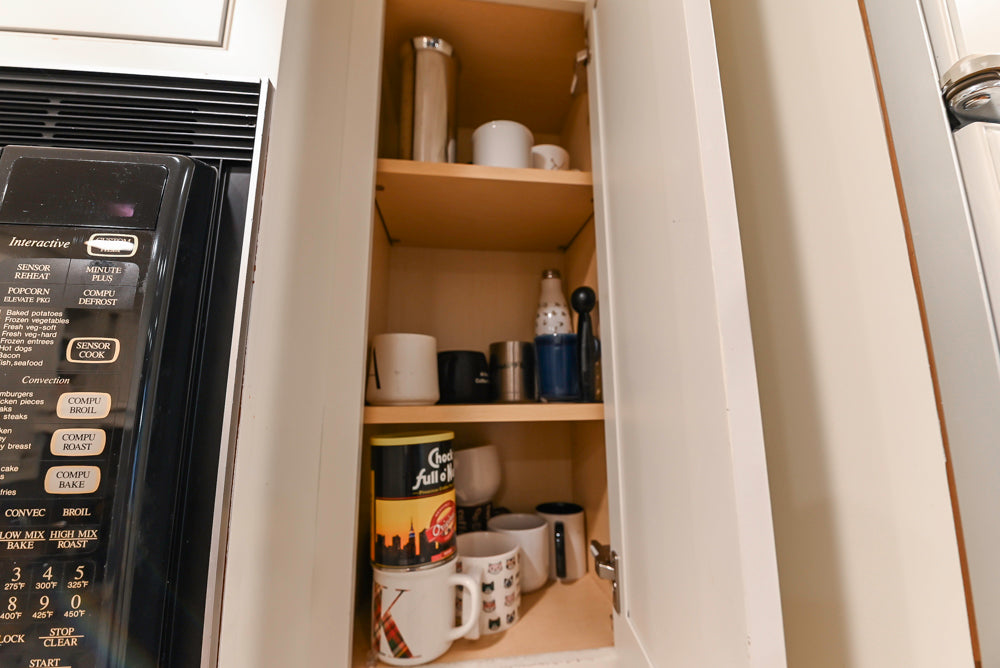 Plain & Fancy White Kitchen with Side Pantry & Appliances