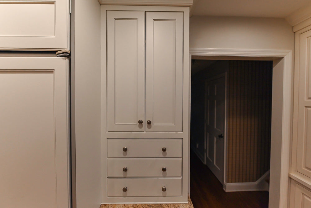 Plain & Fancy White Kitchen with Side Pantry & Appliances