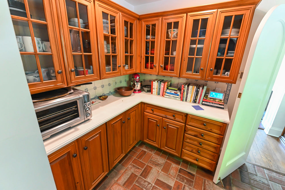 Pre-owned craftsman style pantry storage with furniture grade finish
