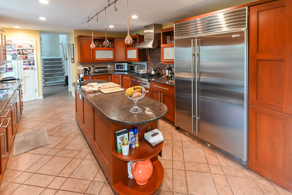 Luxury custom inset wood cabinetry kitchen system with matching center island