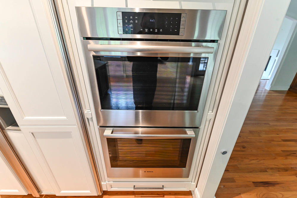 "The Montgomery" Transitional White Kitchen with Blue Island & Appliances