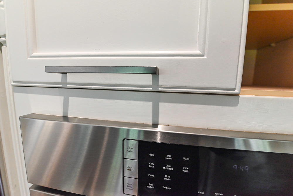 "The Montgomery" Transitional White Kitchen with Blue Island & Appliances