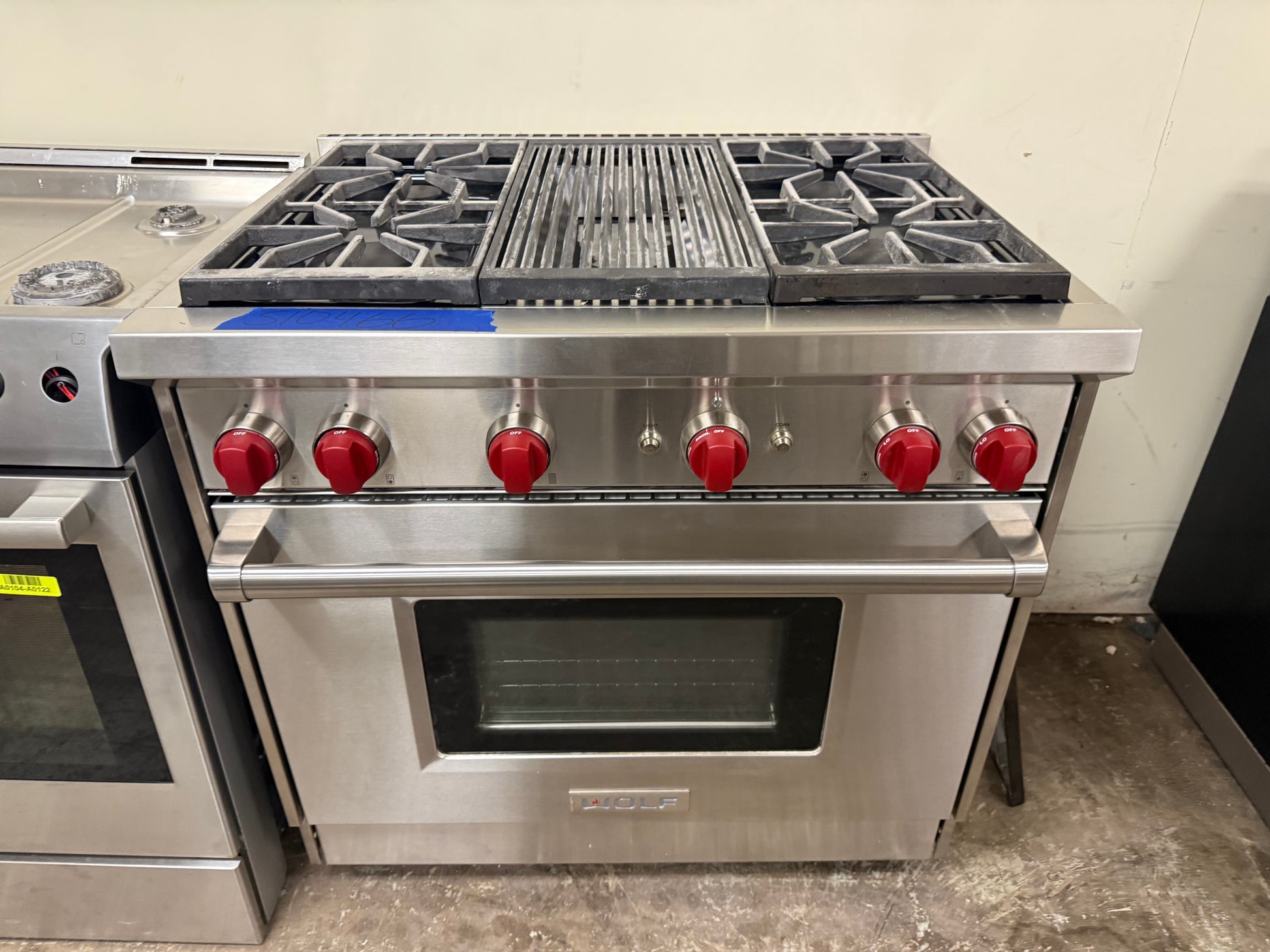 Wolf GR364C 36 inch professional gas range front view stainless steel with iconic red knobs