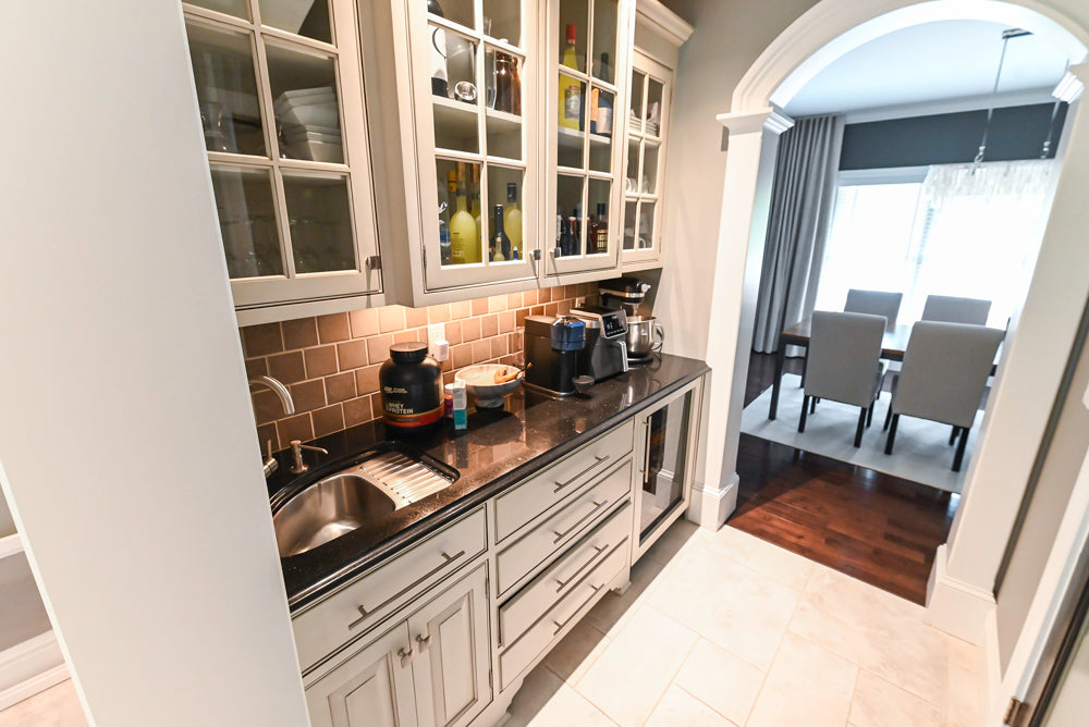 Pre-owned traditional off-white home bar system with prep sink and faucet