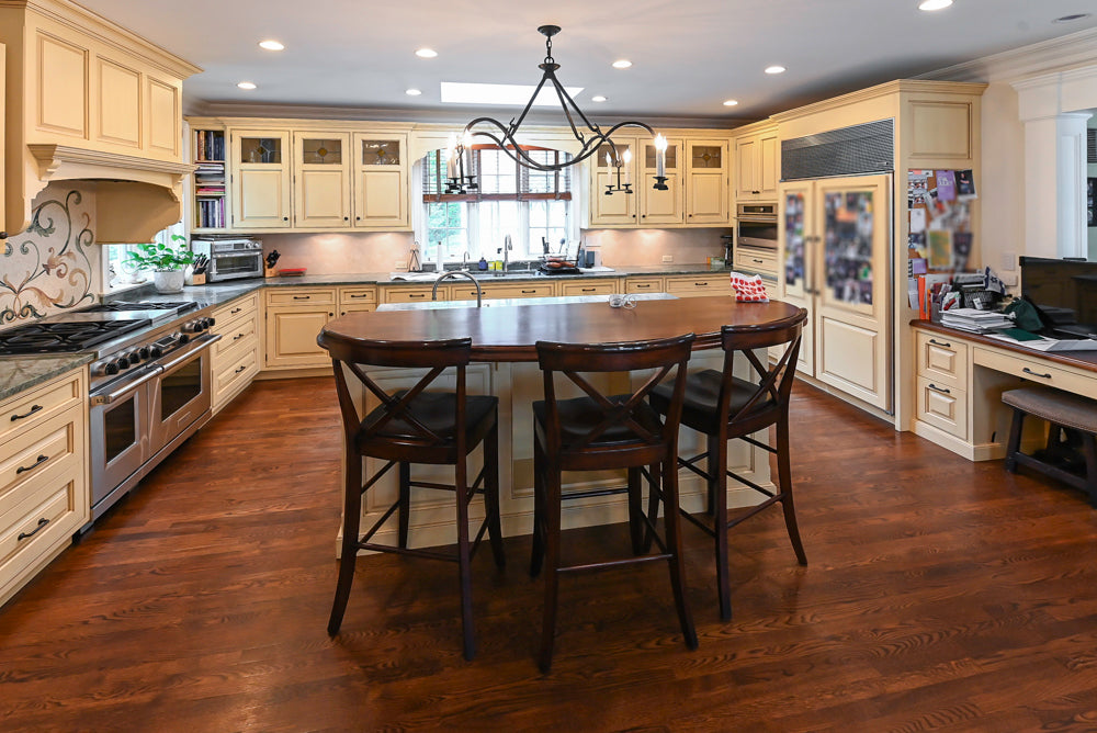 Woodcraft Traditional Light Yellow Kitchen with Island & 48" Wolf Range