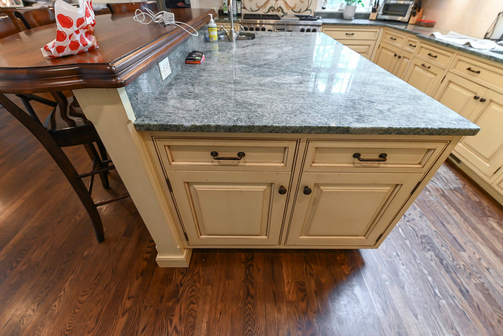 Woodcraft Traditional Light Yellow Kitchen with Island & 48" Wolf Range